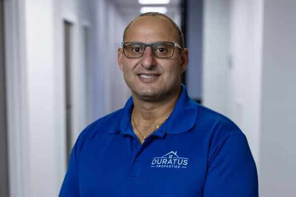 a man in a blue shirt