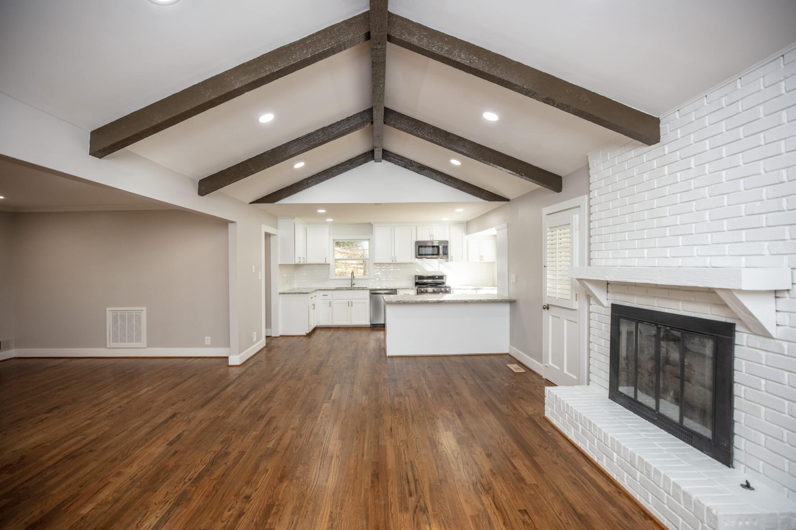 a kitchen with a wood floor