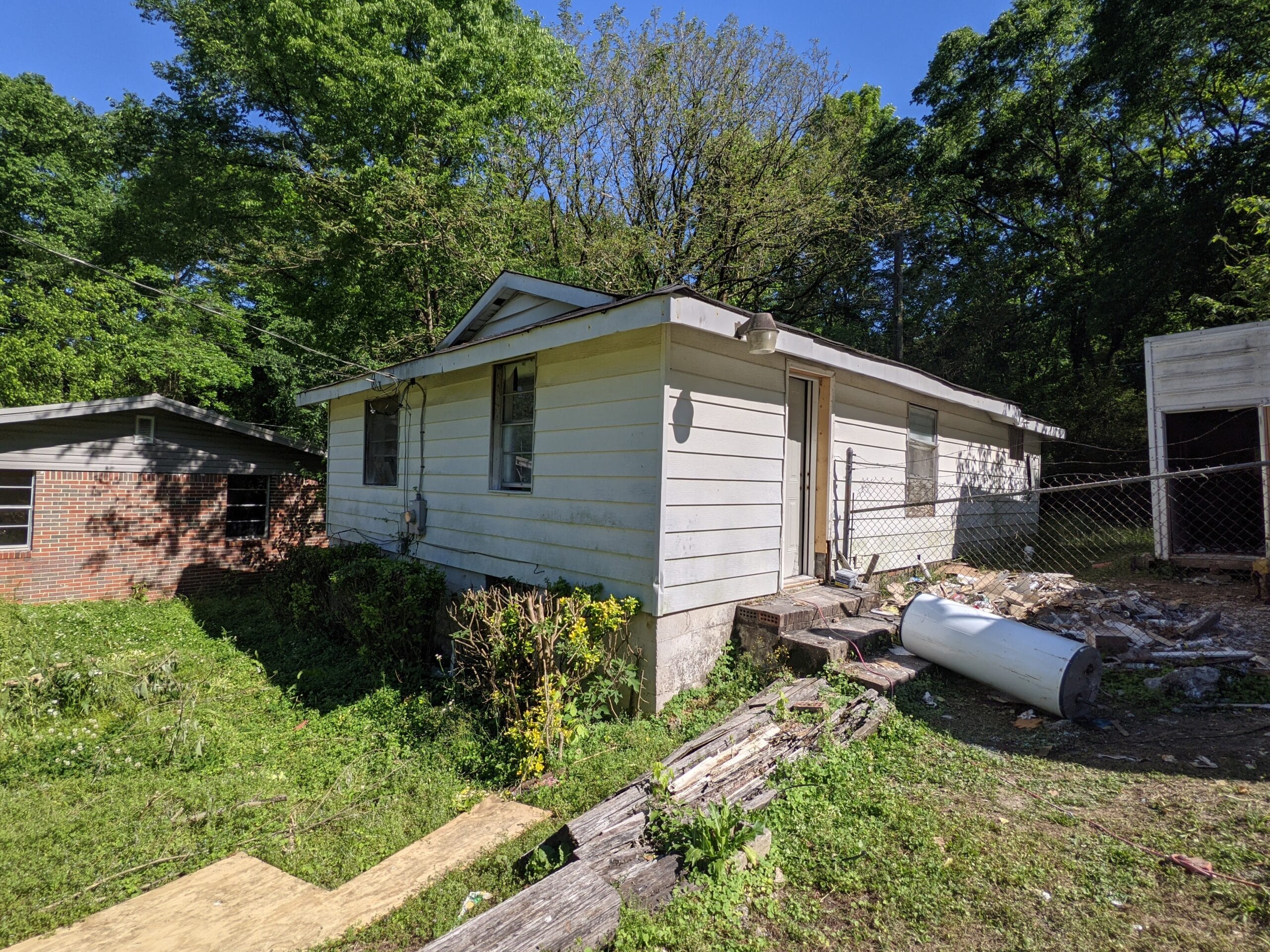 a house with trees in the back yard