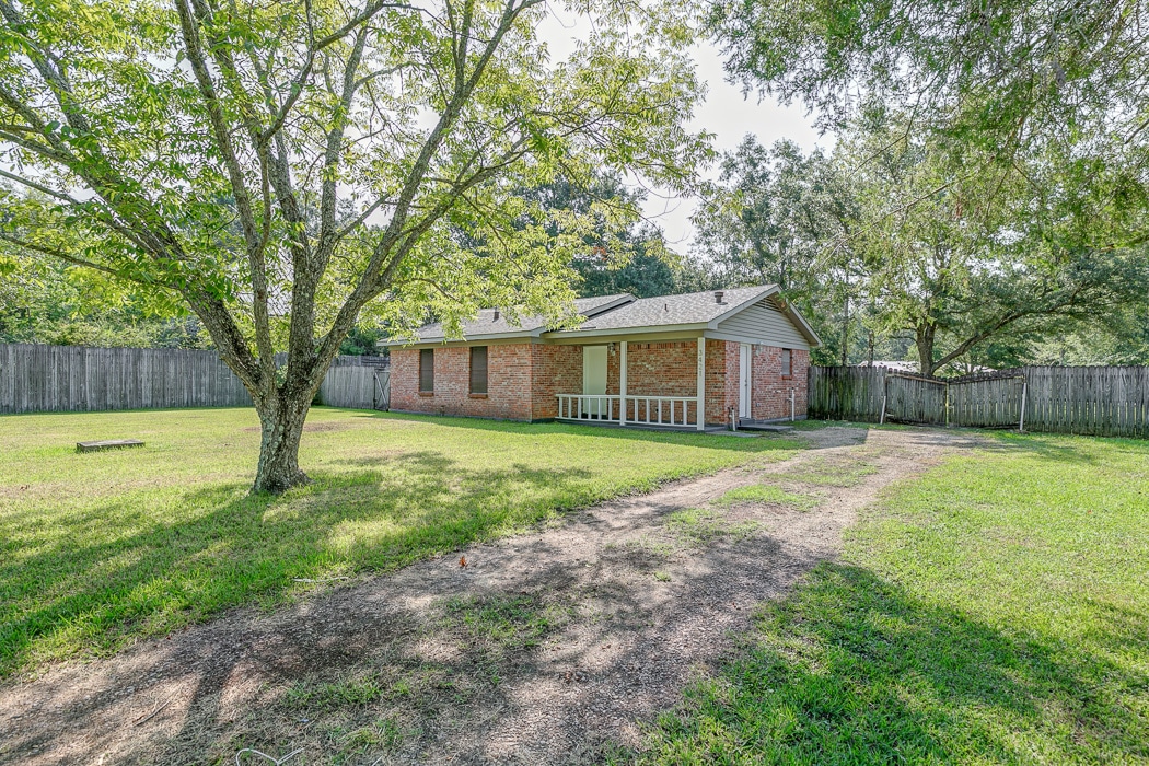 a house with a grass field