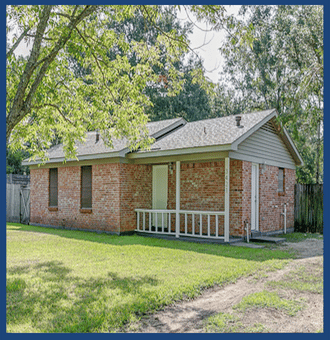 a house with a grass field